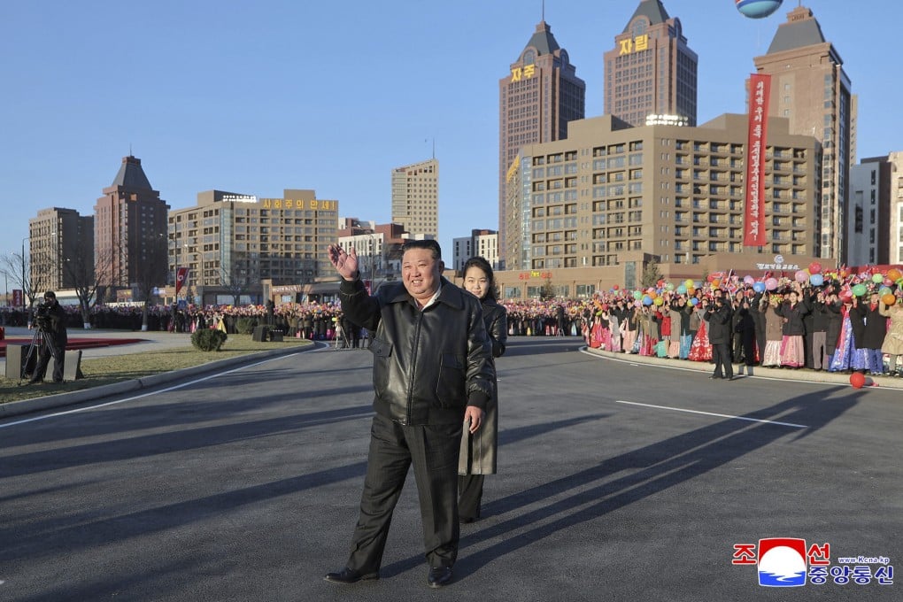 North Korean leader Kim Jong-un greets residents in Pyongyang on Monday. Photo: KCNA via KNS/AFP