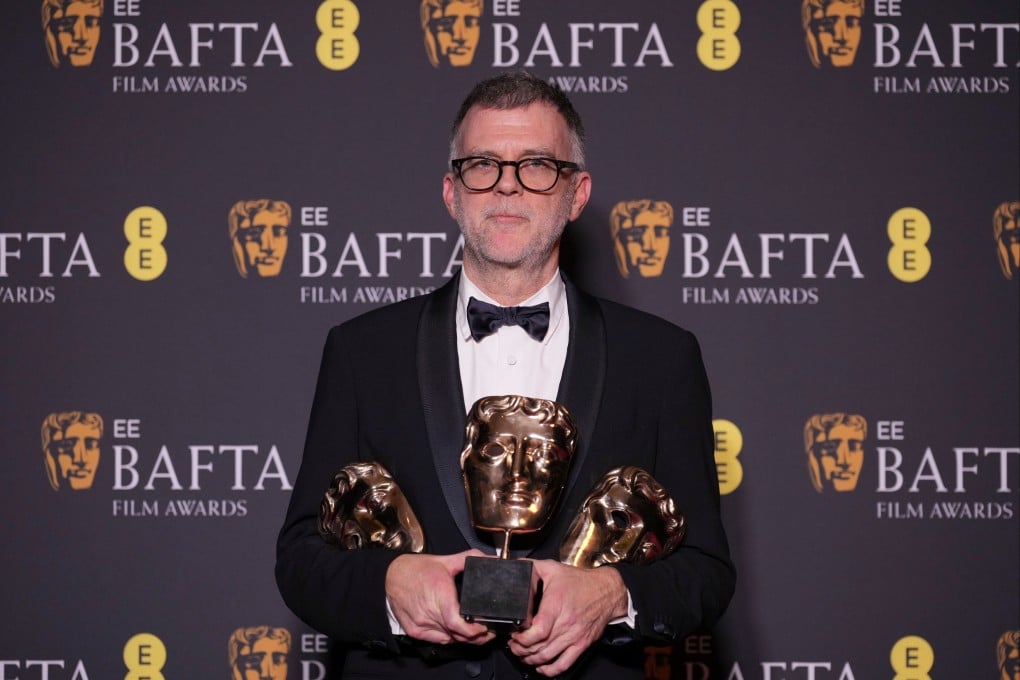 Paul Thomas Anderson with the awards for best director, cinematography, and adapted screenplay for ‘One Battle After Another’. Photo: AP