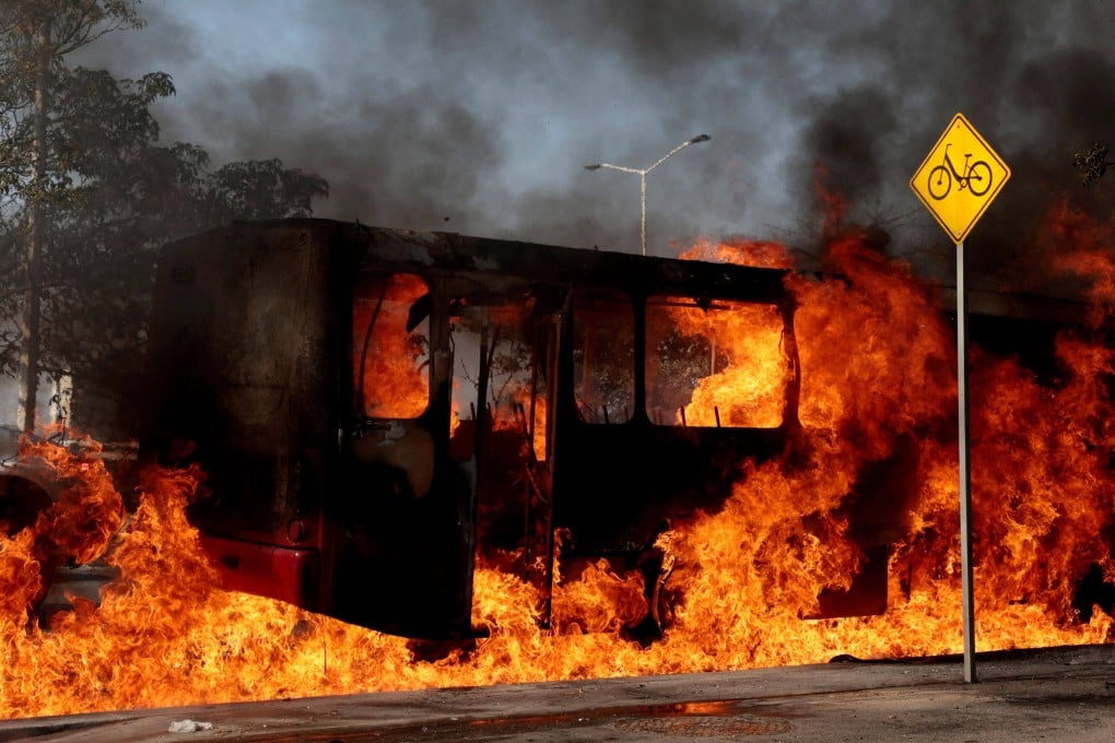 A bus set on fire by organised crime groups in Zapopan, Jalisco state, Mexico on Sunday. Photo: AFP
