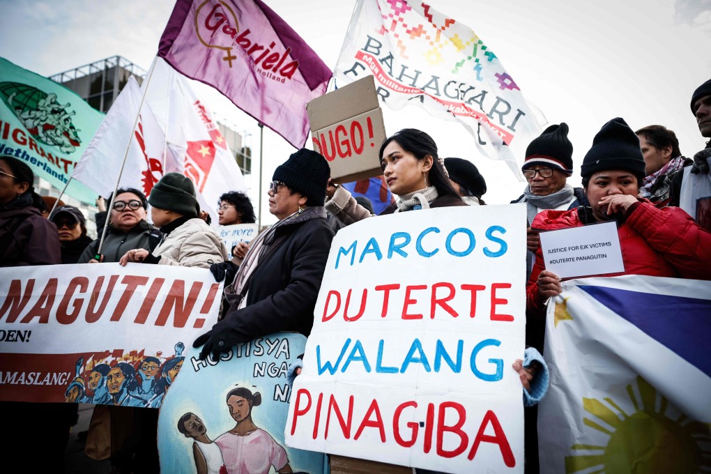 People protest in favour of the detention of former Philippines’ president Rodrigo Duterte outside the International Criminal Court where he will be questioned on charges of crimes against humanity, in The Hague on Monday. Photo: AFP
