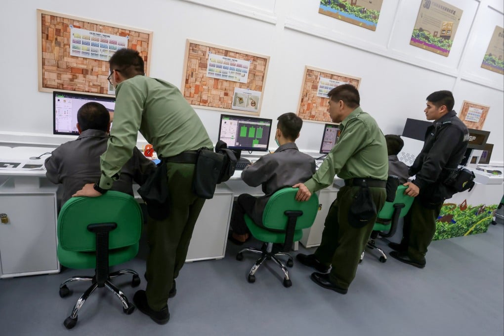 Inmates access computers during a media tour of a Hong Kong prison. Photo: Jonathan Wong