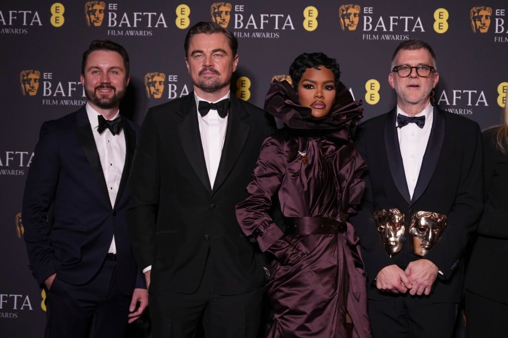 From left, Andy Jurgensen, Leonardo DiCaprio, Teyana Taylor and Paul Thomas Anderson with the awards for best director, cinematography and adapted screenplay for One Battle After Another at the Baftas in London on Sunday. Photo: AP