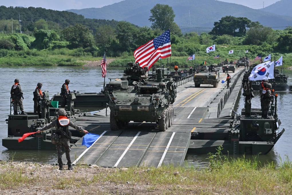 US and South Korean armoured vehicles cross a floating bridge as part of last year’s Ulchi Freedom Shield joint military exercise. Photo: AFP