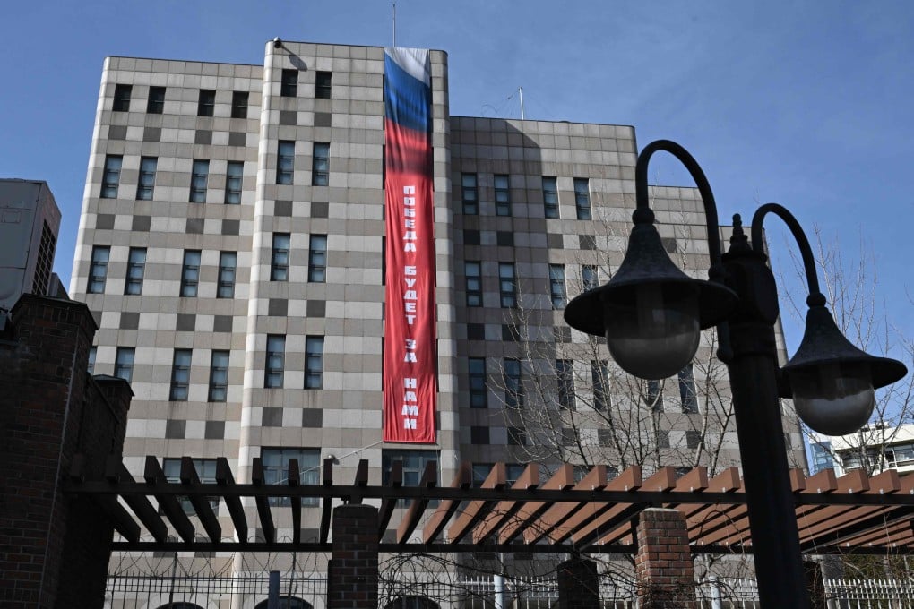 A banner reading ‘Victory will be ours’ on the exterior wall of the Russian embassy in Seoul. Photo: AFP