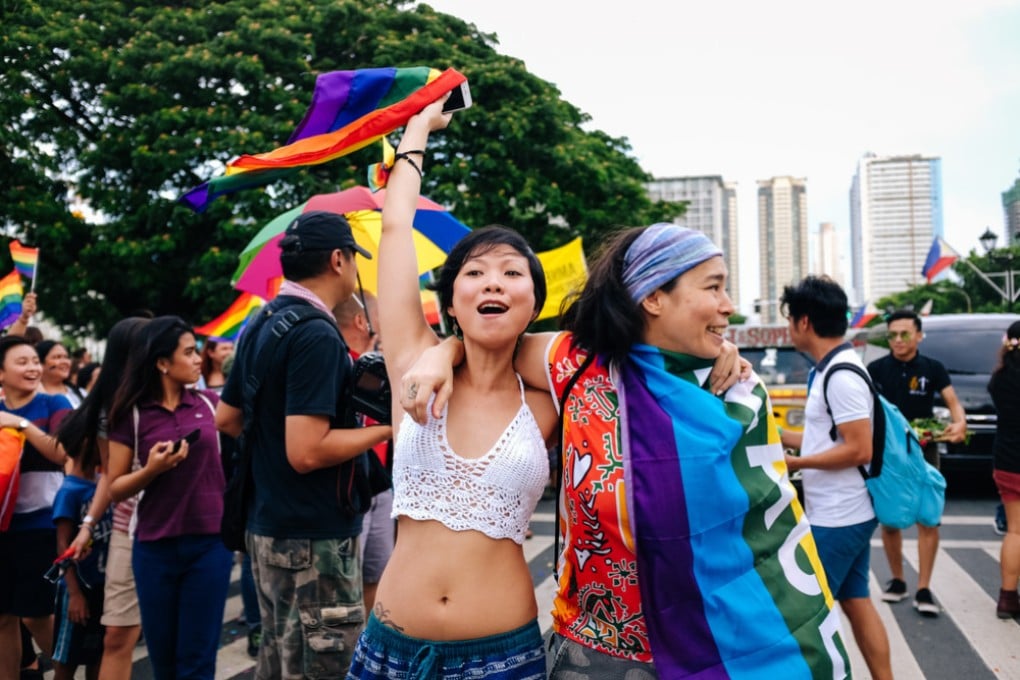 A same-sex couple joins “Metro Manila Pride”, the longest-running pride march in Southeast Asia, in 2016. Photo: Shutterstock
