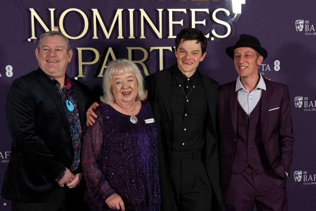From left, John Davidson, Dottie Achenbach and Robert Aramayo at the Baftas nominees’ party in London on Saturday. Photo: Reuters