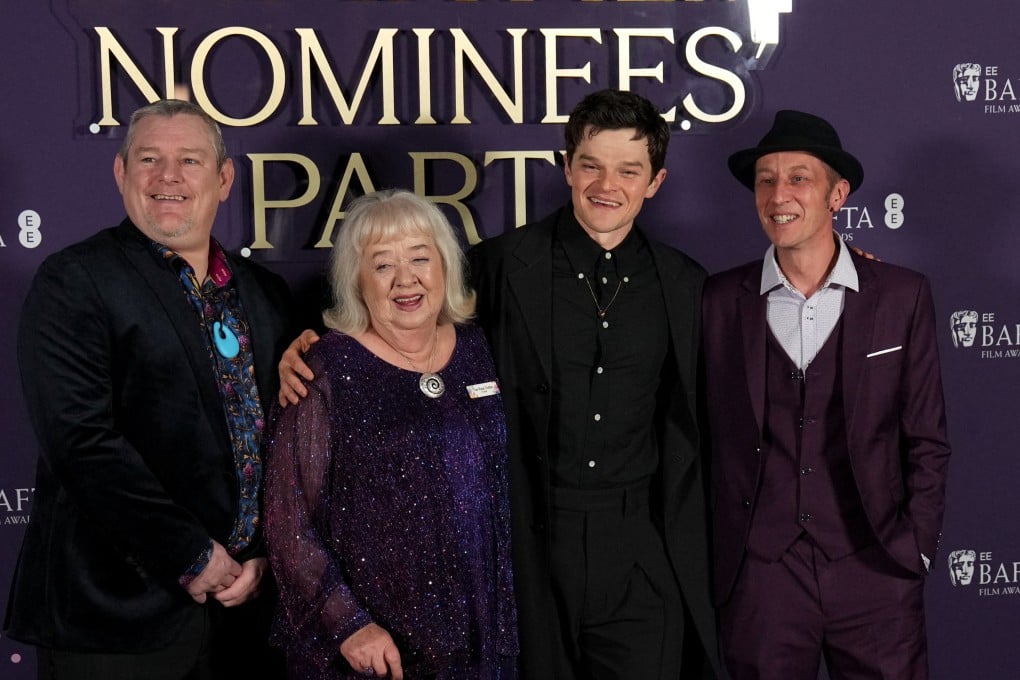 From left, John Davidson, Dottie Achenbach and Robert Aramayo at the Baftas nominees’ party in London on Saturday. Photo: Reuters