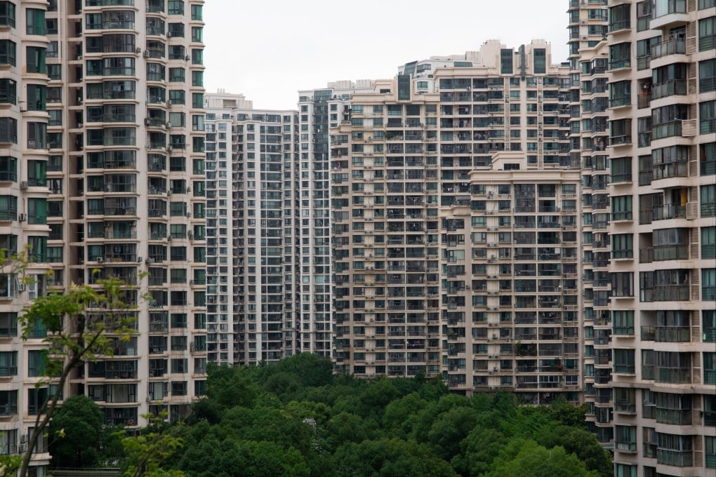 Residential buildings are seen along the Suzhou Creek in Shanghai, June 27, 2024. Photo: NurPhoto via Getty Images