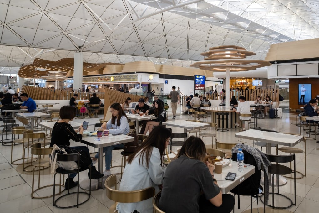 People dine at the food court in the departures area of Hong Kong International Airport. Photo: Shutterstock