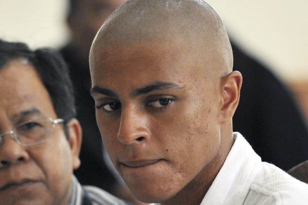 Tommy Schaefer sits next to an interpreter during his trial in Denpasar on January 14, 2015. Photo: Antara/Reuters