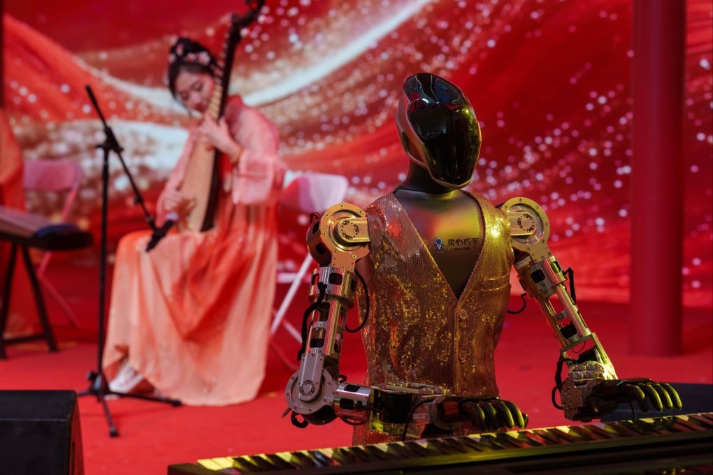 A humanoid robot plays piano during a traditional music performance in Beijing on Thursday. China has elevated science and technology to the core of its national development strategy. Photo: AP