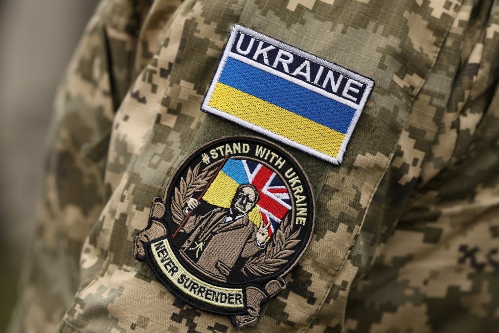 Ukrainian soldiers and partner forces attend a commemoration service marking the fourth anniversary of Russia’s full-scale invasion of Ukraine at a British Army training camp in East Anglia, Britain, on Tuesday. Photo: Reuters