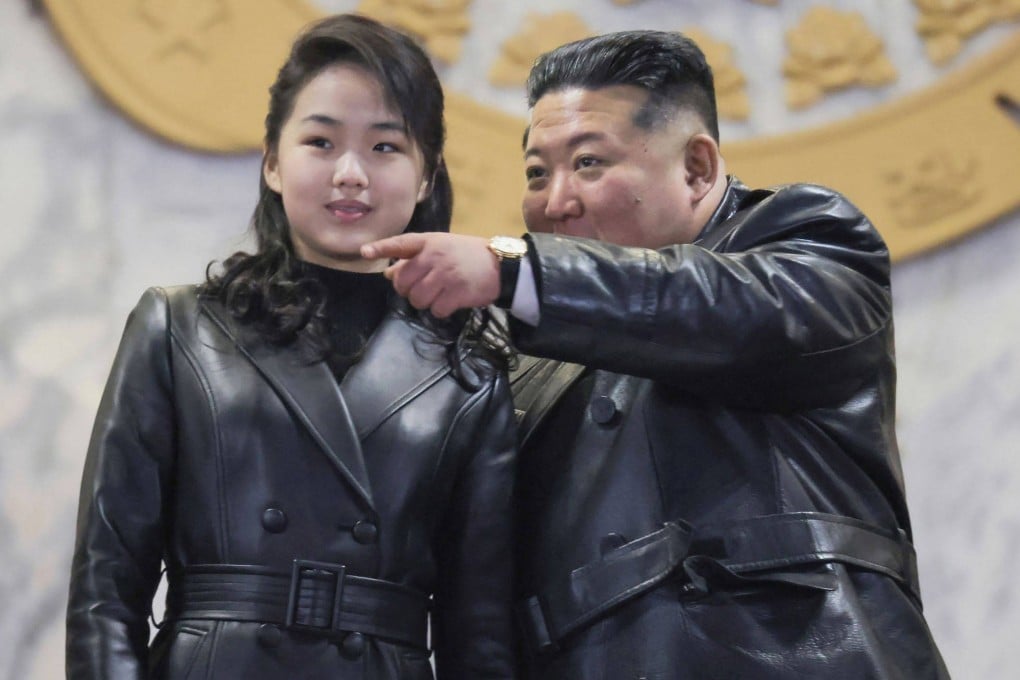 North Korean leader Kim Jong-un  and daughter Ju-ae attend a military parade to commemorate the Ninth Workers’ Party congress on Wednesday. Photo: KCNA/AFP