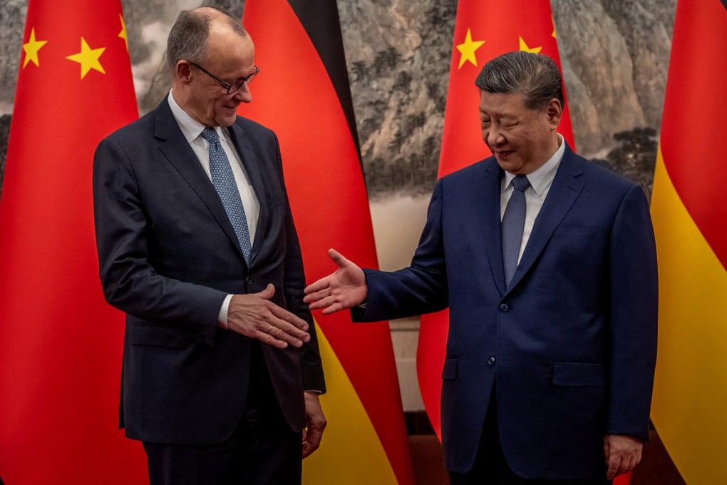German Chancellor Friedrich Merz, left, shakes hands with President Xi Jinping at the state guesthouse in Beijing on February 25. Photo: Reuters