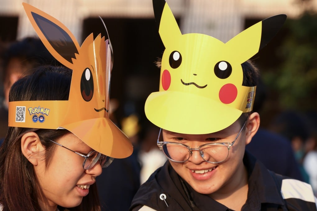 Pokemon fans take part in the Pokemon Go City Safari event in Hong Kong in December 2024, a two-day event that saw players able to “catch” the virtual creatures at the city’s landmarks. Photo: Dickson Lee