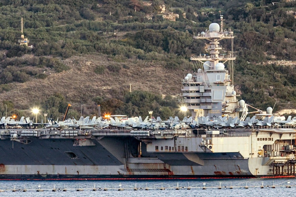 The American aircraft carrier USS Gerald R Ford docks at the Greek island of Crete on Tuesday. Photo: AFP