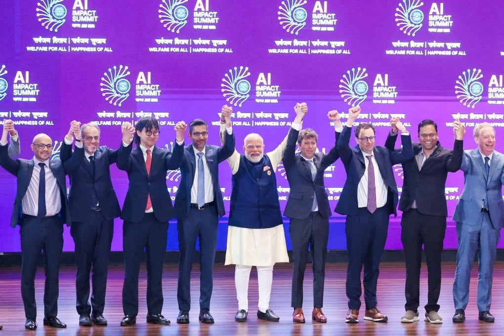 Indian Prime Minister Narendra Modi (centre) poses with global tech leaders including Google’s Sundar Pichai and OpenAI’s Sam Altman at the AI Impact Summit in New Delhi on February 19. Photo: India’s Press Information Bureau/Reuters