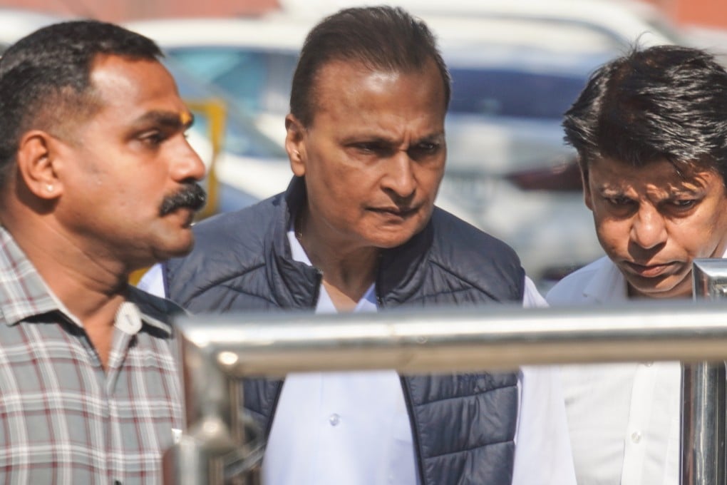 Indian industrialist Anil Ambani (centre) appears before the Enforcement Directorate in New Delhi on Thursday. Photo: AP