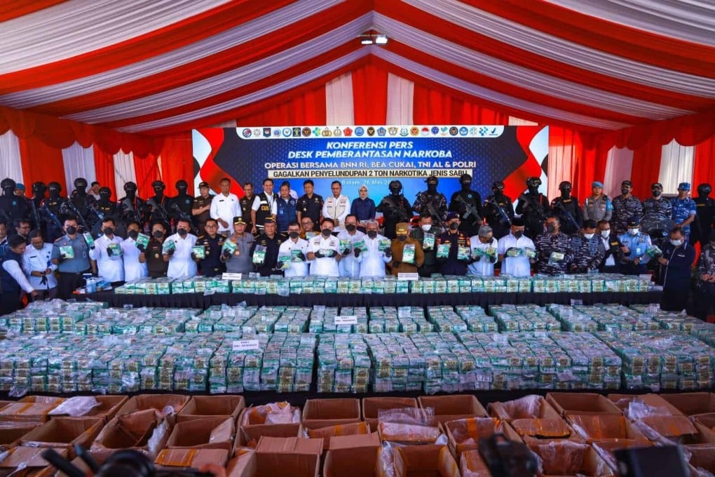 Officials from Indonesia’s National Narcotics Agency and other law enforcement bodies present nearly two tonnes of methamphetamine seized in the Riau Islands. Photo: Indonesia’s National Narcotics Agency (BNN)