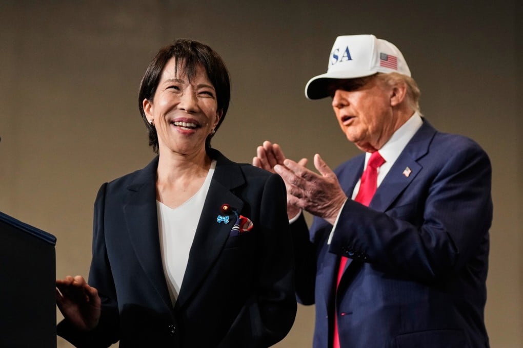 Japanese Prime Minister Sanae Takaichi, with US President Donald Trump, speaks to members of the military aboard the USS George Washington aircraft carrier docked at the American naval base in Yokosuka, Japan on October 28, 2025. Photo: AP