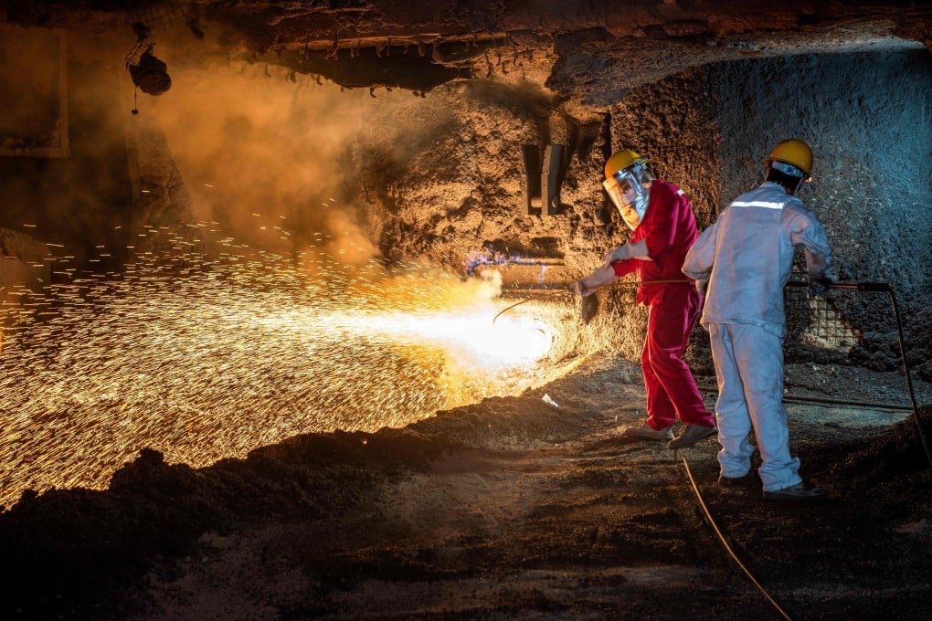 Molten steel sparks fly at a factory in Huaian, Jiangsu province. Photo: AFP