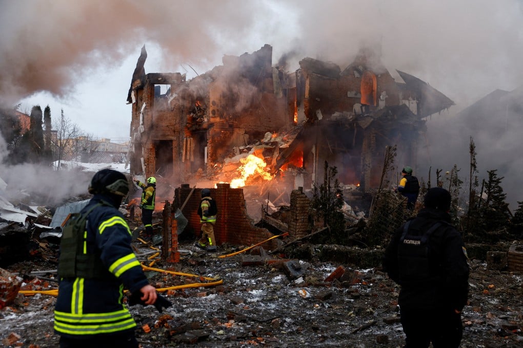 Firefighters work at the site of a residential building damaged during Russian drone and missile strikes in Kyiv, Ukraine, on February 22. Photo: Reuters