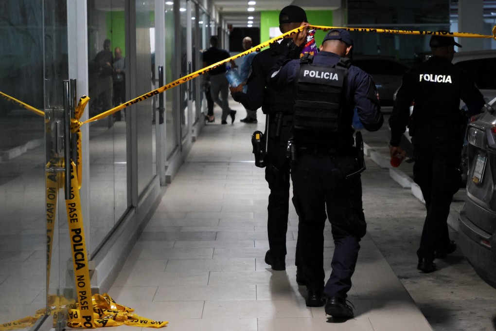 Panamanian police search a Panama Ports Company office. Photo Reuters