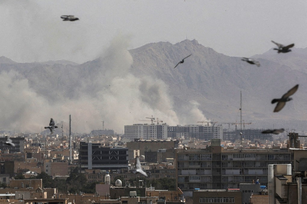 Smoke rises in the Iranian capital Tehran following Israeli and US strikes on Saturday. Photo: WANA via Reuters