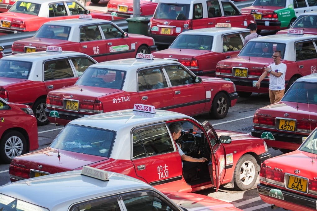 Hong Kong taxi drivers gather at Hong Kong International Airport in Chek Lap Kok. Photo: Eugene Lee