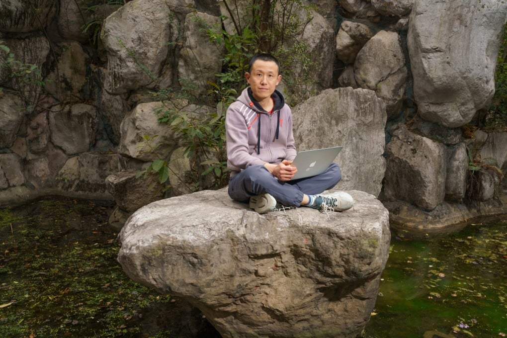 Chinese writer Hu Anyan in People’s Park, Chengdu, China. Hu’s book, I Deliver Parcels in Beijing, is a visceral, ground-level tour of China’s service economy over two decades – a world of cramped alleyway deliveries, managerial scorn and the physical toll of freelance work. Photo: Eric Mast