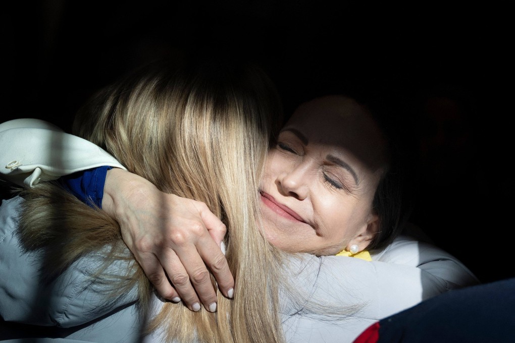 Venezuelan opposition leader Maria Corina Machado greets a supporter in Washington. Photo: AFP