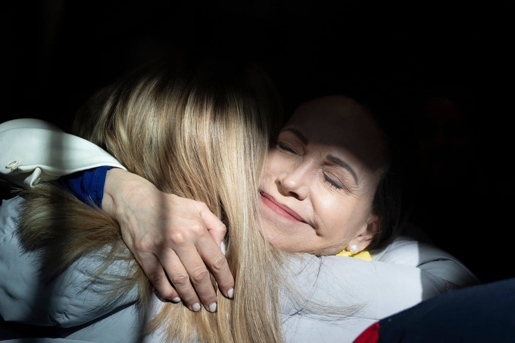 Venezuelan opposition leader Maria Corina Machado greets a supporter in Washington. Photo: AFP