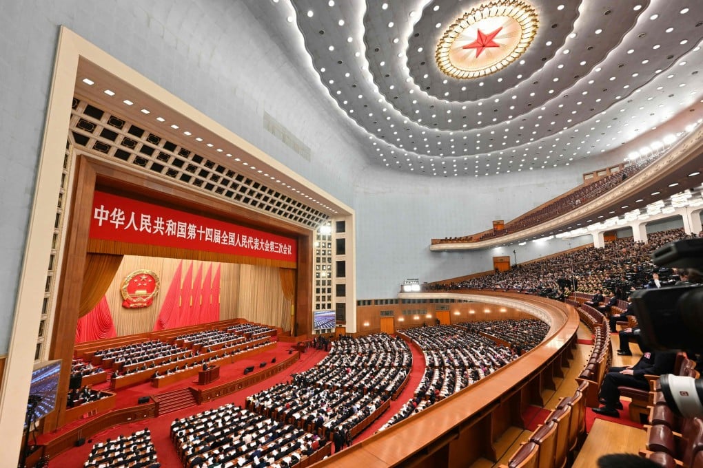 Delegates at the opening session of the National People’s Congress at the Great Hall of the People in Beijing on March 5, 2025. Photo: AFP