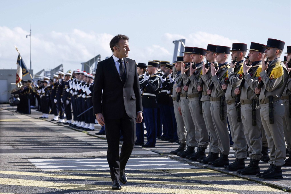 France’s President Emmanuel Macron during a visit to Ile Longue nuclear submarine base. Photo: AFP