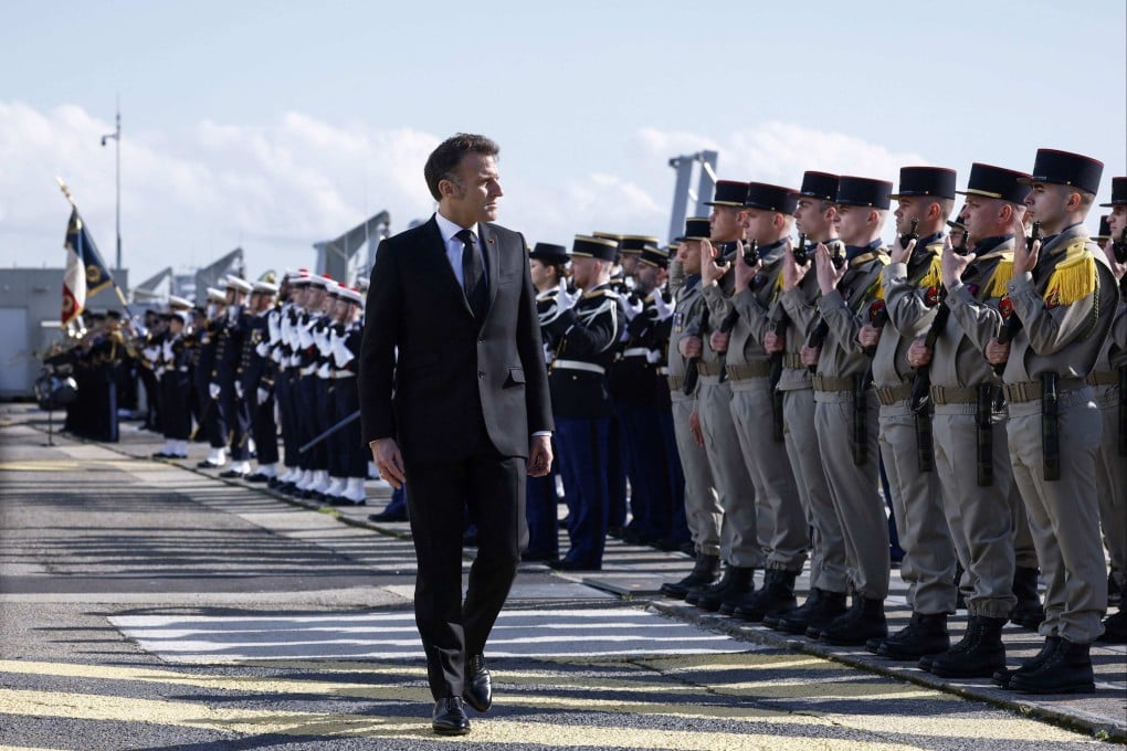 France’s President Emmanuel Macron during a visit to Ile Longue nuclear submarine base. Photo: AFP