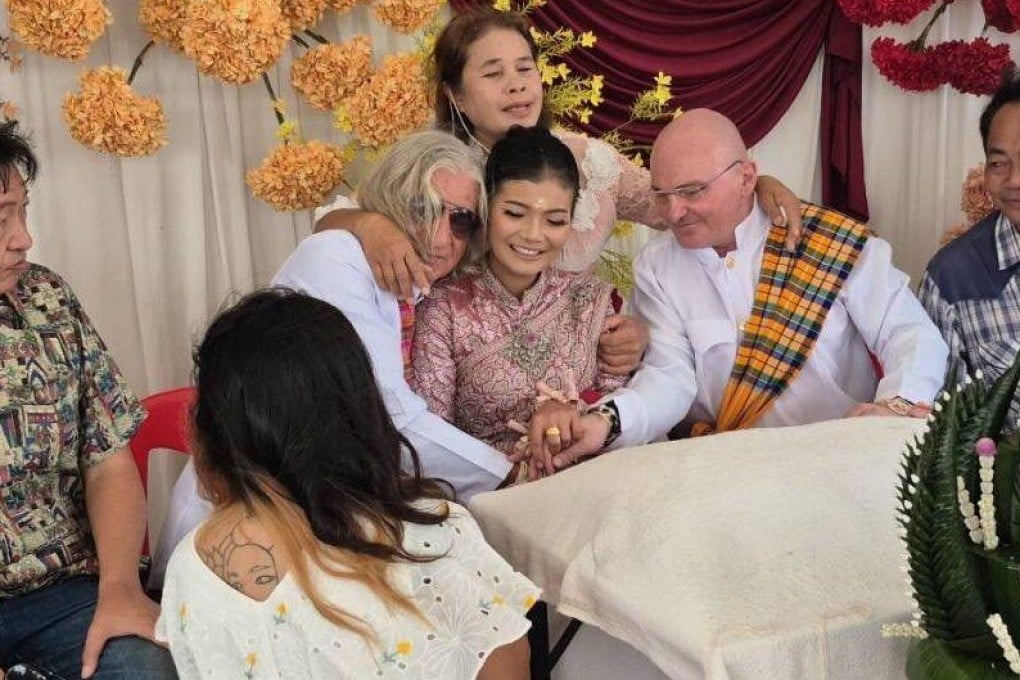 Dujduan Ketsaro with her two grooms, Roman and Macky. Photo: Facebook