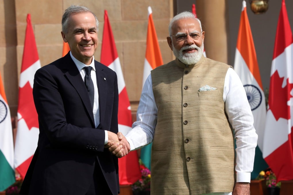 Indian Prime Minister Narendra Modi (right) shakes hands with Canadian Prime Minister Mark Carney in New Delhi on Monday. Photo: EPA