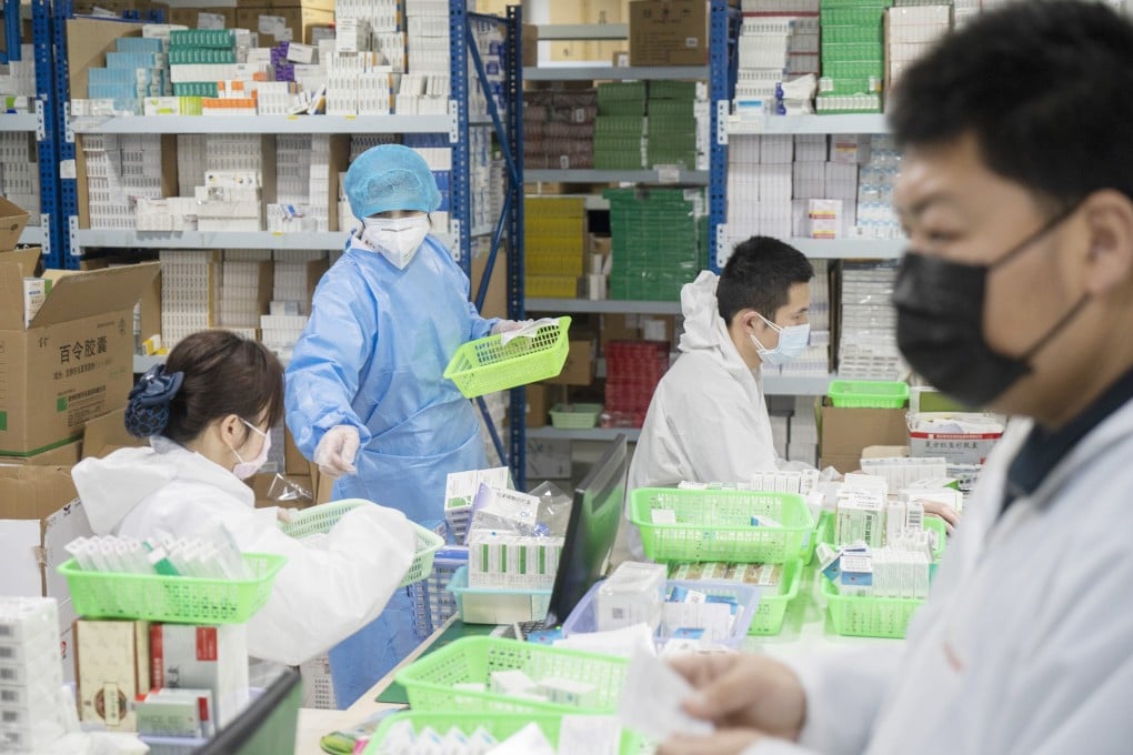 Staff members dispense medicines at a pharmacy in Wuhan, in central China’s Hubei province, on February 27, 2020. Photo: Xinhua