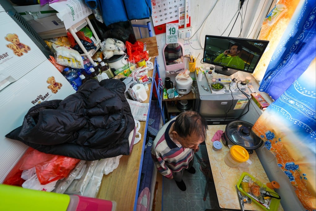 A tenant in his subdivided flat at the Yee Wa Building in Cheung Sha Wan on January 19. Photo: Eugene Lee