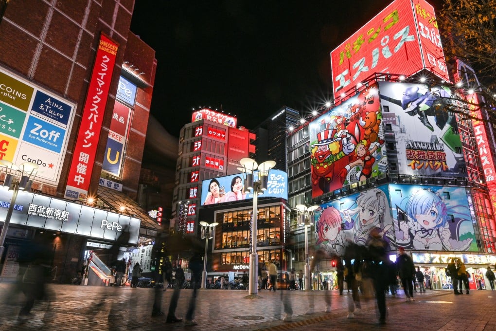 People walk through the Kabukicho red-light area in Tokyo’s Shinjuku district. Photo: AFP