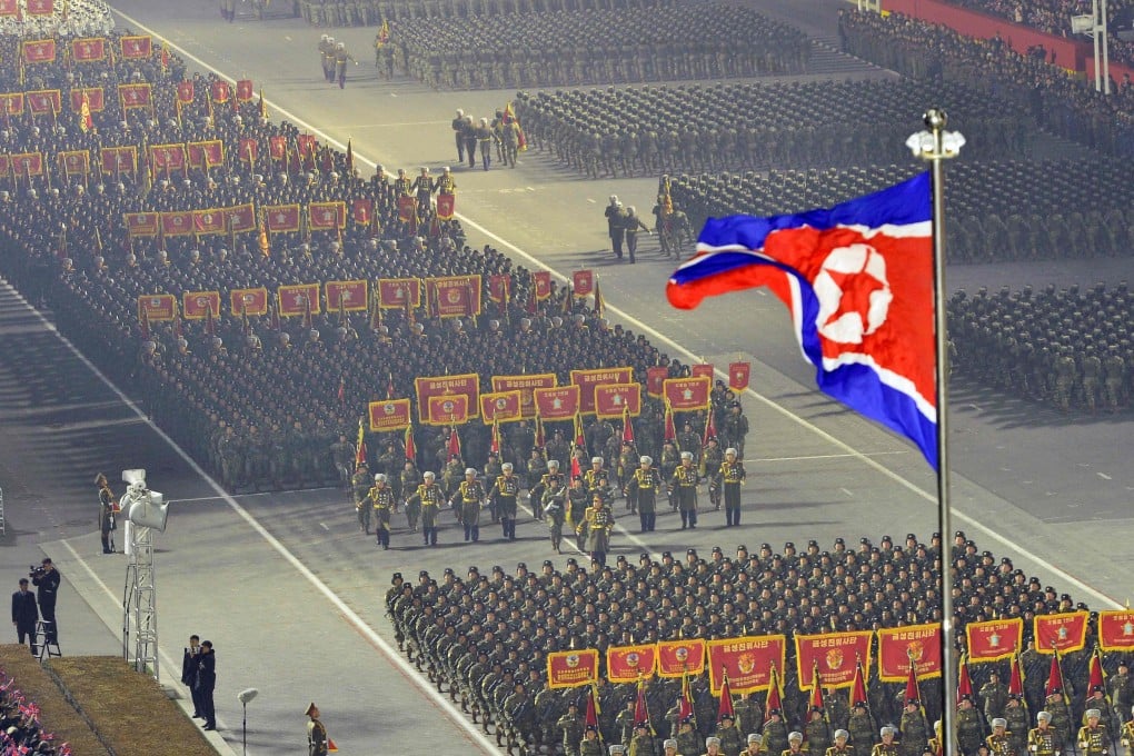 Troops march through Kim Il-Sung Square in Pyongyang for a military parade on February 25. Photo: KCNA/KNS/AFP
