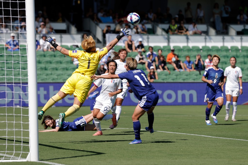 Taiwan goalkeeper Wang Yu-Ting (left) making one of her many saves against Japan in their Women’s Asian Cup group C match at HBF Park in Perth on Wednesday. Photo: EPA