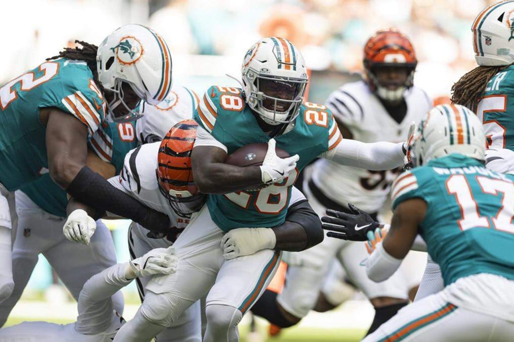 Miami Dolphins running back De’Von Achane (28) and his team in action against the Cincinnati Bengals at Hard Rock Stadium in Miami Gardens, Florida in December. Photo: TNS