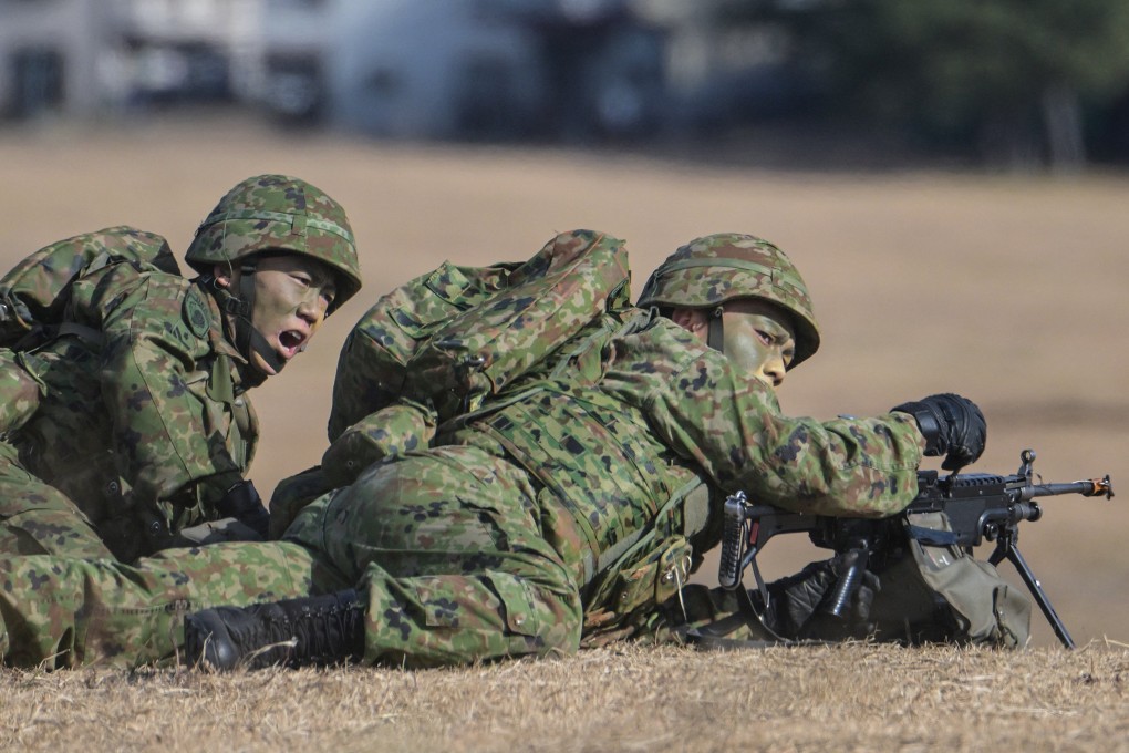 Japanese troops take position during a joint military drill in Funabashi, Chiba prefecture, on January 7. Photo: AFP