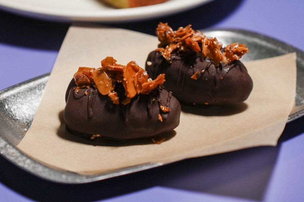Dark chocolate covered stuffed medjool dates at Migas Hong Kong. Photo: Handout