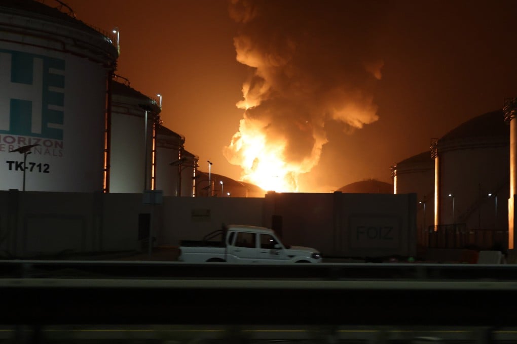 Flames rise during a fire caused by debris from an intercepted drone at the oil refinery hub in Fujairah, United Arab Emirates, on March 4. Photo: EPA