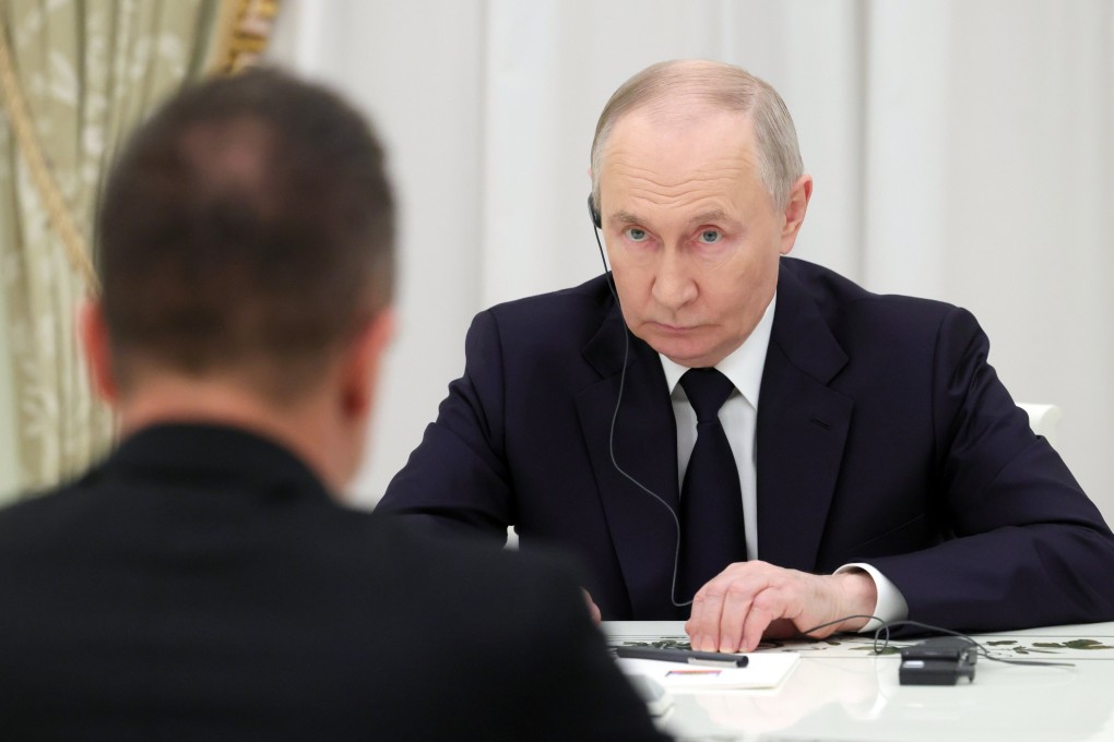 Russian President Vladimir Putin attends a meeting at the Kremlin in Moscow on Wednesday. Photo: Sputnik via EPA