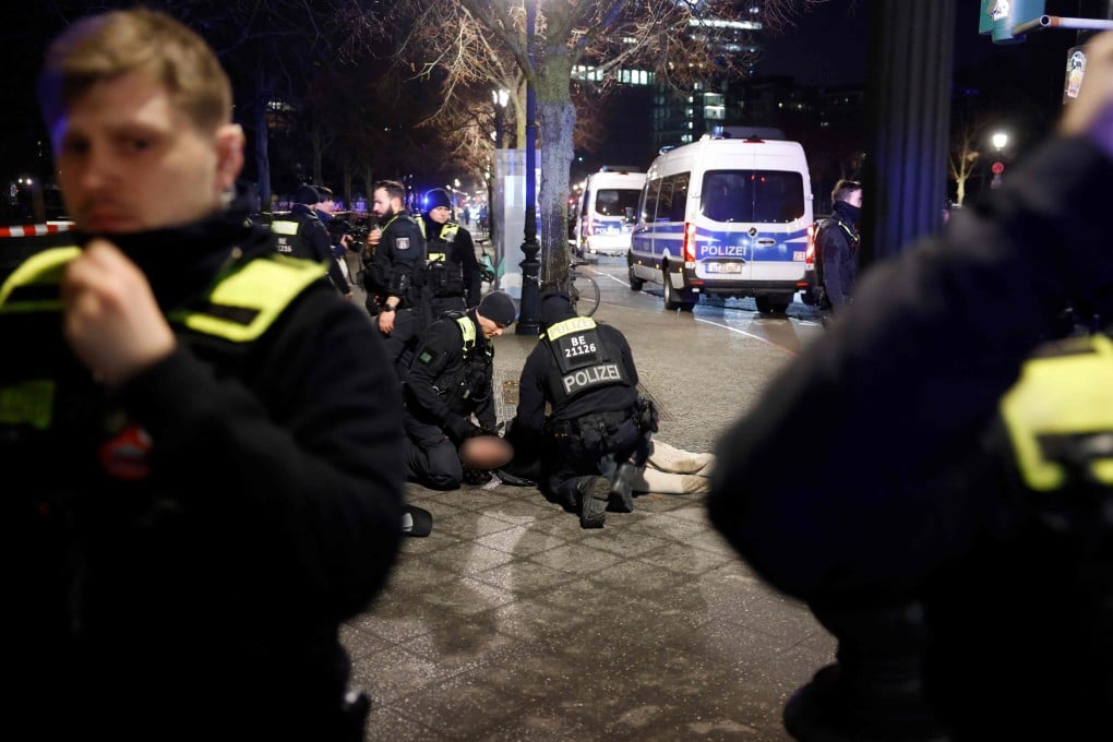 Police apprehend a suspect at the scene where a person was stabbed near Berlin’s Holocaust memorial in Berlin on February 21, 2025. Photo: AFP