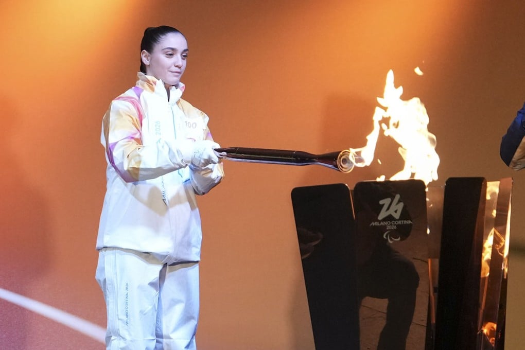 Torchbearer Matilde Villa lighting the cauldron during the Milano-Cortina 2026 Paralympics torch relay in Venice, Italy on Wednesday. Photo: Xinhua