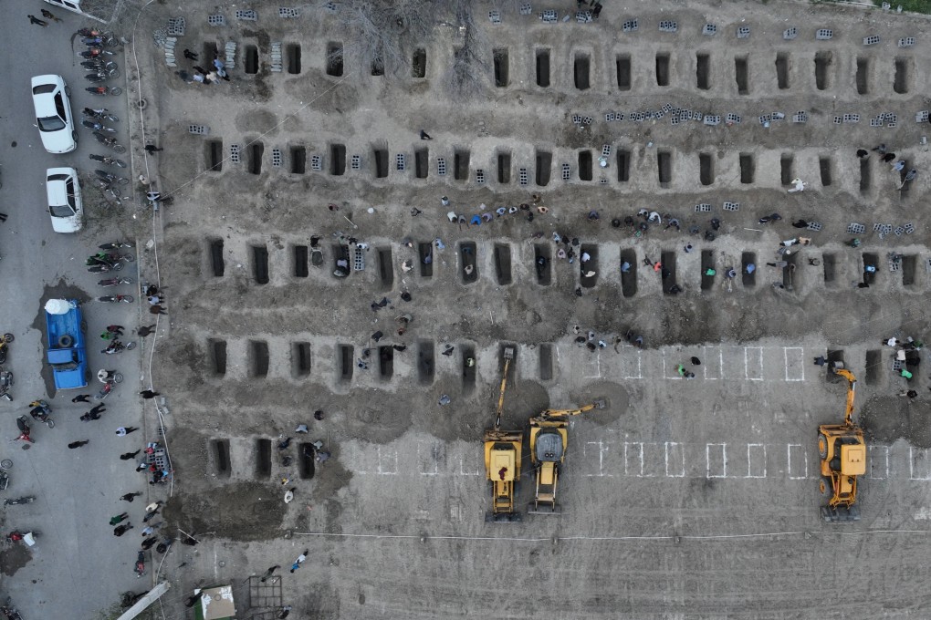 Graves for victims of the strike on a school in Minab, Iran. Photo: Iranian Foreign Media Department via Reuters